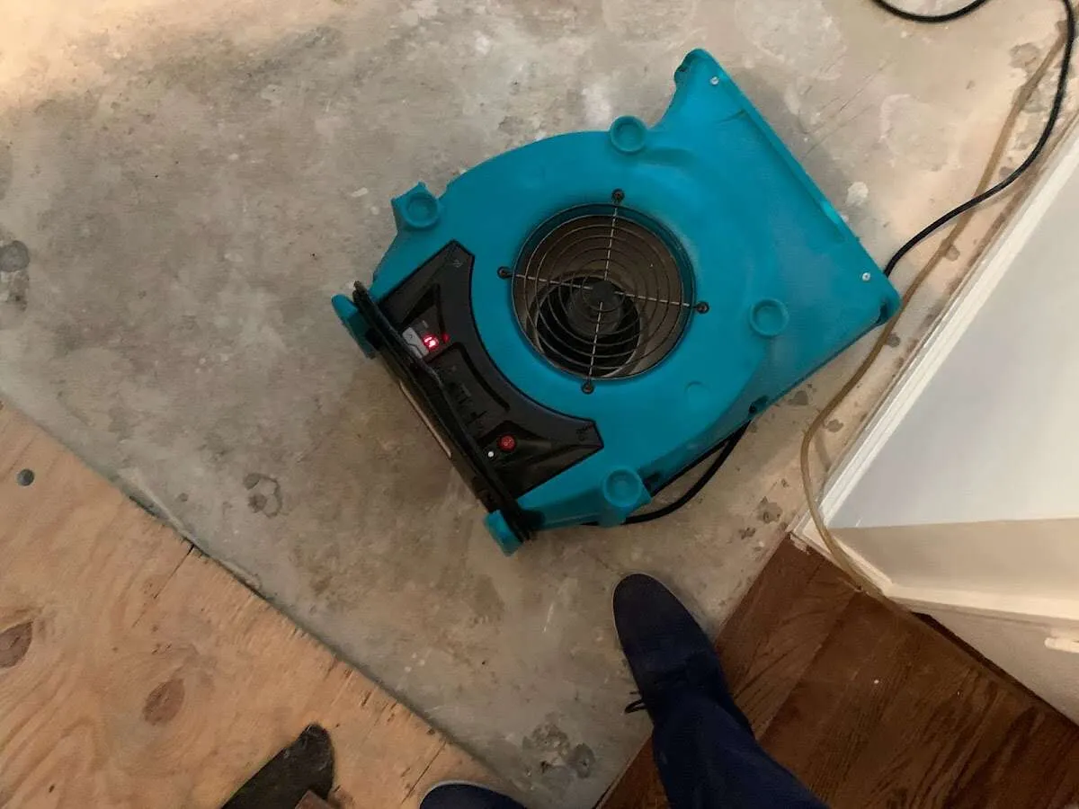 Air mover drying subfloor during Leak Detection & Repair in Lampasas